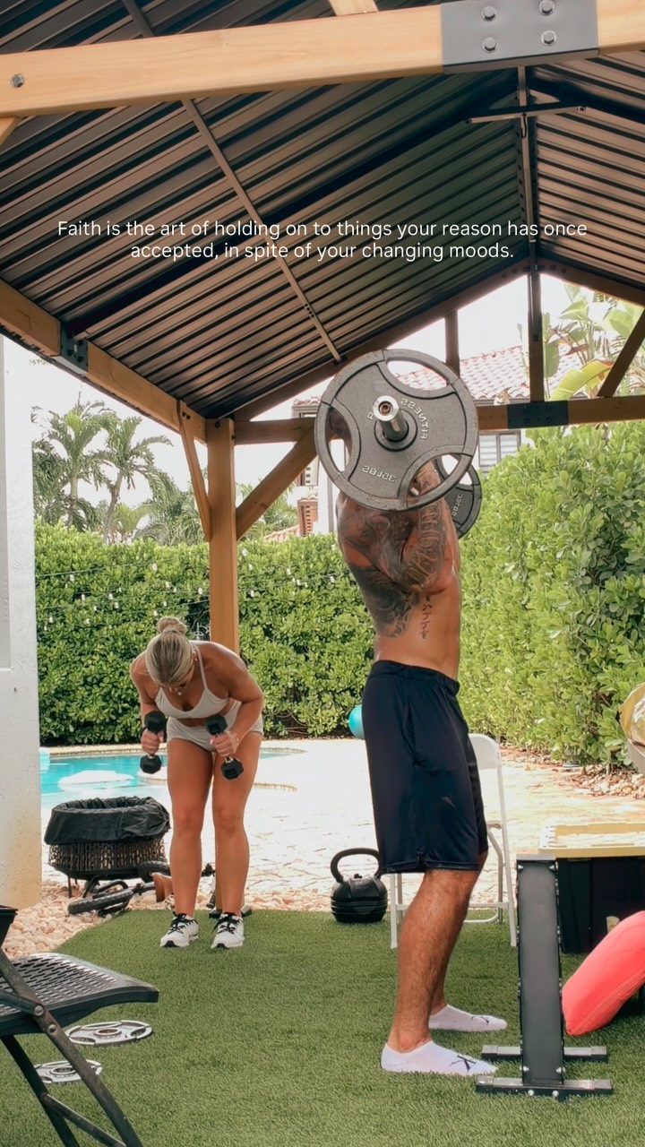 Leovany lifting weights during an outdoor workout